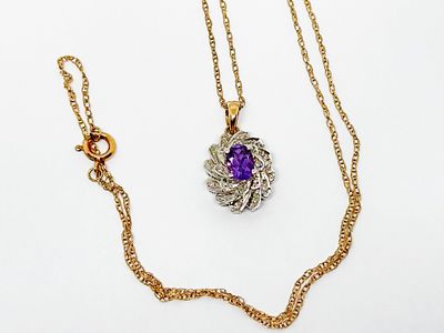 Złoty 375/9K naszyjnik z Ametystem i Diamentami 0.10 Ct. Masa wyrobu: 3.72 gram, wymiary 