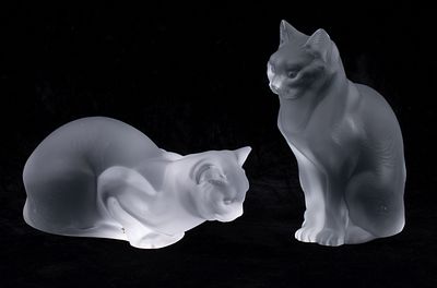 TWO LARGE FROSTED CRYSTAL CAT FIGURES SIGNED LALIQUE. Late 20th Century The pair, one crouching 