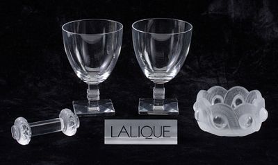LALIQUE ARGOS STEMS, TABLE ARTICLES AND DEALER PLAQUE. Late 20th Century The acrylic sign is 