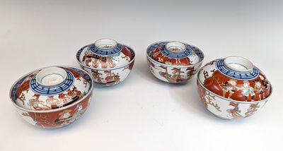 JAPANESE ARITA IMARI BLACK SHIP BOWL & COVER SETS. The assembled set of four porcelain wares are 