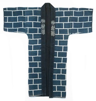 JAPANESE FIREMAN'S COAT WITH BRICK MOTIF, ADAIR ESTATE. The striking Japanese firefighter's 