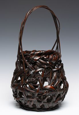 TANABE CHIKUUNSAI I BAMBOO IKEBANA BASKET, ADAIR ESTATE. The globular form is composed of broad 