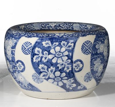 AN EARLY 20C. JAPANESE HIBACHI WITH PAINTED PANELS. The large hand painted blue and white 