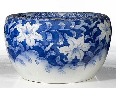 AN EARLY 20C. JAPANESE BLUE & WHITE HIBACHI W/LILIES. The large hand painted blue and white 
