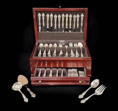 A 125 PIECE SERVICE OF SPANISH BAROQUE STERLING SILVER. The 125 piece set is in the Spanish 
