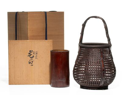 CHIKUBOSAI I (1872-1950) IKEBANA BASKET, ADAIR ESTATE. The bulbous ''Treasure Bag'' flower 