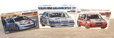 3 unopened Tamiya 1/24 scale models, Mitsubishi Lancer Evolution V WRC, Peugeot 206 WRC , Volvo