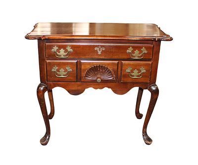 A.A. Laun scallop top shell carved low boy. A.A. Laun queen anne 2 drawer scallop top shell