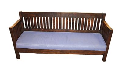 Antique mission oak slatted double arm bench. Antique mission oak slatted double armed bench in