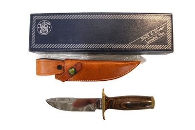 Smith & Wesson #6030 knife & sheath in original box, new old stock. Smith & Wesson new old