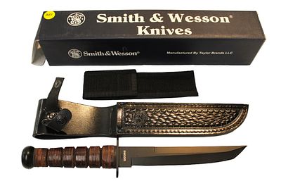 Smith & Wesson combat knife with sheath in original box with paperwork, new old stock. Smith