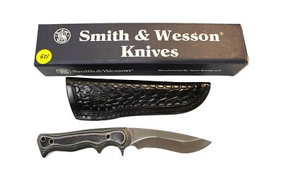 Smith & Wesson Micarta Hunter 8.375" fixed blade knife in original box with paperwork. Smith