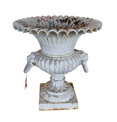 Antique cast iron victorian garden urn. Antique cast iron covered Victorian garden urn.