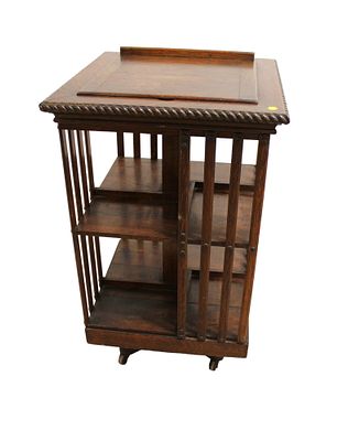 NICE MODEL Antique quartersawn oak revolving bookcase with lift top bookstand in original