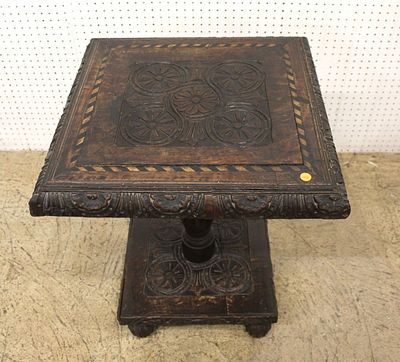 Antique Victorian Ornate Carved Table. Antique oak highly carved and ornate lamp table, orig.