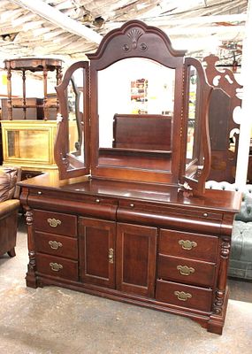 Contemporary Dresser with Tri Fold Mirror. Contemporary mahogany finish 8 drawer 2 door dresser