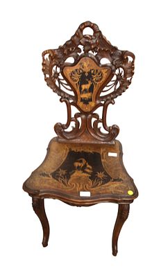 Antique black forest highly carved and inlaid walnut musical chair, original condition, working