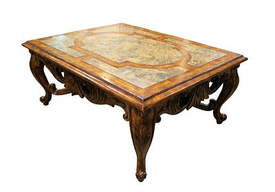 Impressive Maitland Smith coffee table, highly carved with marble inlay in the distressed walnut. 