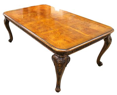 Great Henredon dining room table, burl walnut with carved skirting, with (2) 21" skirted leaves,. 