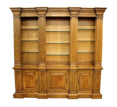 Henredon open bookcase display on 3 door base, 2 part, fluted columned, in the light walnut finish