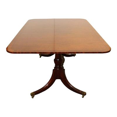 Quality solid banded mahogany dining room table with (3) 16" leaves attributed to Baker
