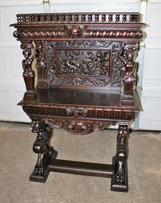 Antique highly carved and ornate mahogany server in the manner of RJ Horner approx. 40" w x 19"