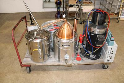 Approximately 14 pieces of home brewing equipment