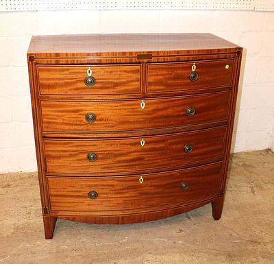 Beautiful antique 5 drawer bow front mahogany chest with inserted key Escutcheons, circa 1870s. B