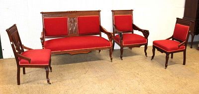 Antique 4pc Victorian walnut and mahogany parlor set in the bright red upholstery in