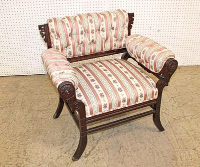 Antique Victorian button tuft walnut arm chair in newer upholstery, back foot has been repaired