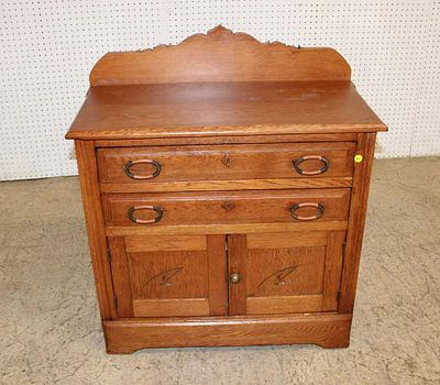 Antique oak 2 drawer 2 door washstand with backsplash approx. 31" w x 16" d x 35" h