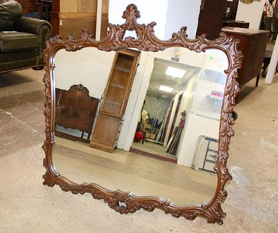 Solid mahogany carved decorator mirror approx. 46" w x 48" h