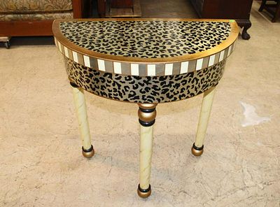 Leopard print paint decorated Demilune console table. Leopard print paint decorated Demilune 