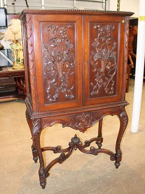 Antique carved blind door butler secretary desk w/key. Antique carved blind door butlers 