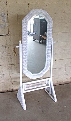 Vintage wicker cheval mirror, structurally loose approx. 30" w x 19" d x 60" h Condition: