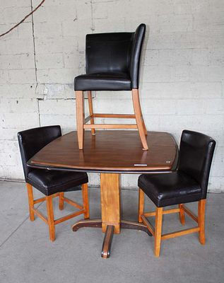 4pc mahogany pub table and 3 chairs. 4pc mahogany pub table with 3 chairs, one being a corner