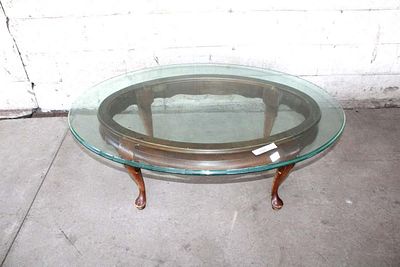 Gordons contemporary glass top coffee table. Gordons contemporary mahogany base glass top coffee