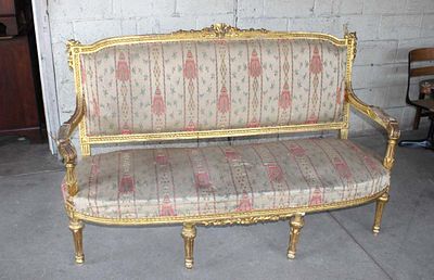 Vintage gold painted frame upholstered sofa. Vintage French style gold painted frame sofa