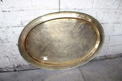 Asian brass decorator hanging tray approx. 44" w x 31" h Condition: message or call with