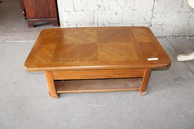 Contemporary oak lift top coffee table approx. 48" w x 28" d x 16" h Condition: message or call