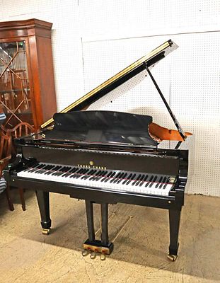 Beautiful Young Chang baby grand piano in the high gloss black lacquer finish, specially
