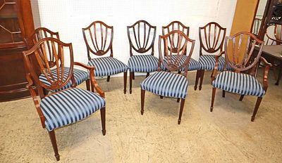 Set of 8 Baker Furniture solid mahogany shield back dining room chairs with roll of upholstery. S