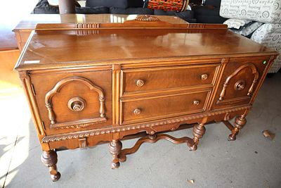 Antique depression walnut sideboard. Antique depression walnut 2 door 2 drawer sideboard approx.
