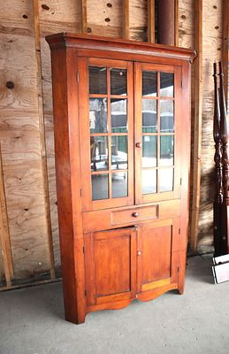Antique solid cherry corner cabinet. Antique 1pc solid cherry 4 door 1 drawer corner cabinet