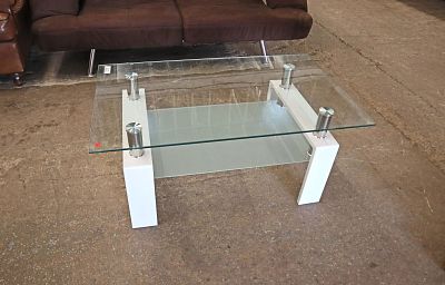 Ultra modern glass top coffee table approx. 39" w x 24" d x 17" h