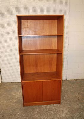 MCM walnut sliding door book shelf. Mid century modern walnut sliding door book shelf approx.