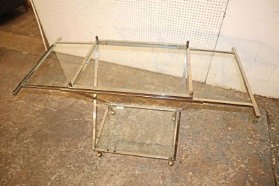 Modern X frame chrome tubular serving cart. Modern X frame chrome tubular glass top serving cart