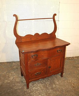 Antique oak washstand with towel bar approx. 32" w x 18" d x 45" h