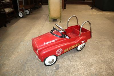 Vintage red metal pedal car fire engine by Instep approx. 17" w x 38" d x 22" h