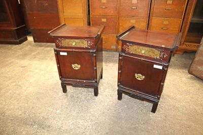 PR Asian inspired hardwood nightstands. Pair of Asian inspired hardwood brass face 1 door 1 